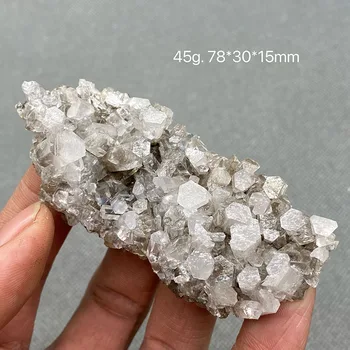 Gamtos skaidrus stulpelio kalcitas yra reti ir išnykę kristalų gem akmens Kinijoje